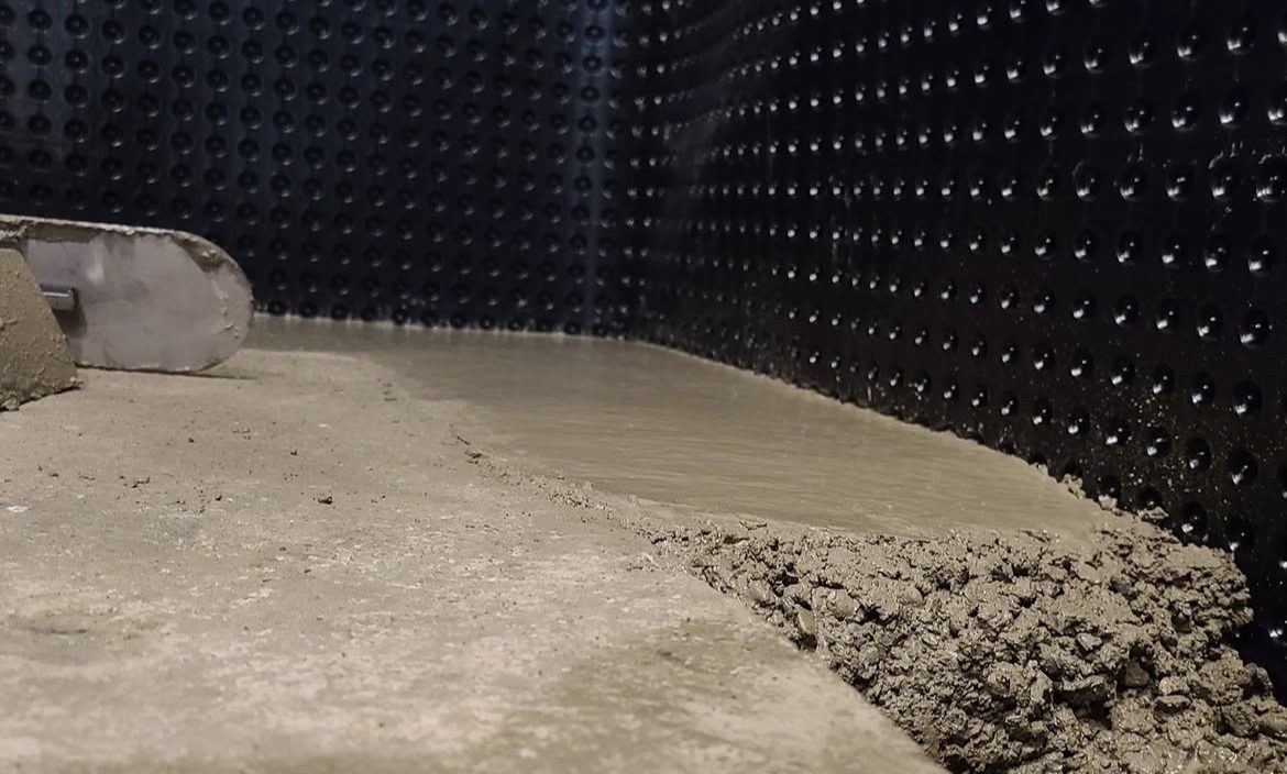 Basement waterproofing membrane installation for foundation moisture protection in Vancouver