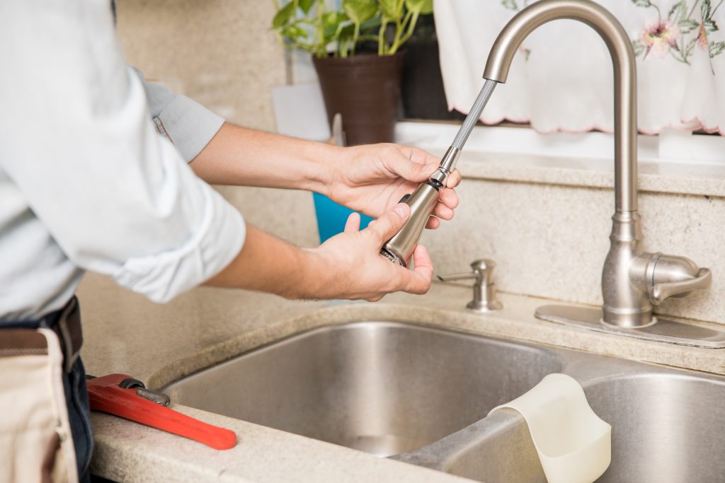 Kitchen faucet leak repair and plumbing service in Vancouver